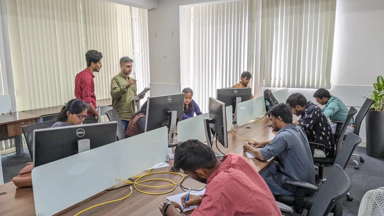 Students being assessed on a live lab build at the Subhanu Jayanagar STEM lab